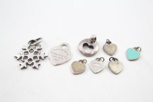 A collection of silver pendants by Tiffany and Co (13g)