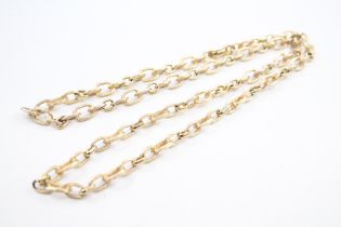 A gold tone chain necklace by Christian Dior (g)