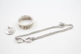 A silver bracelet, ring and pendant by Tiffany and Co (13g)