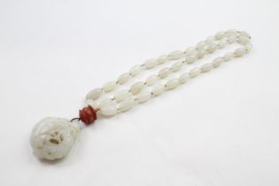 An antique carved nephrite bead necklace for restringing (g)