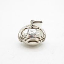 925 HM Sterling Silver concertina photo locket opens up to reveal 4 photographs. Length when open is