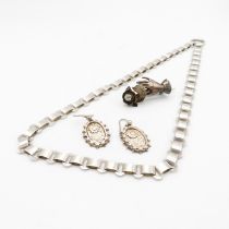 A collection of Victorian silver jewellery including a pair of daisy design aesthetic movement