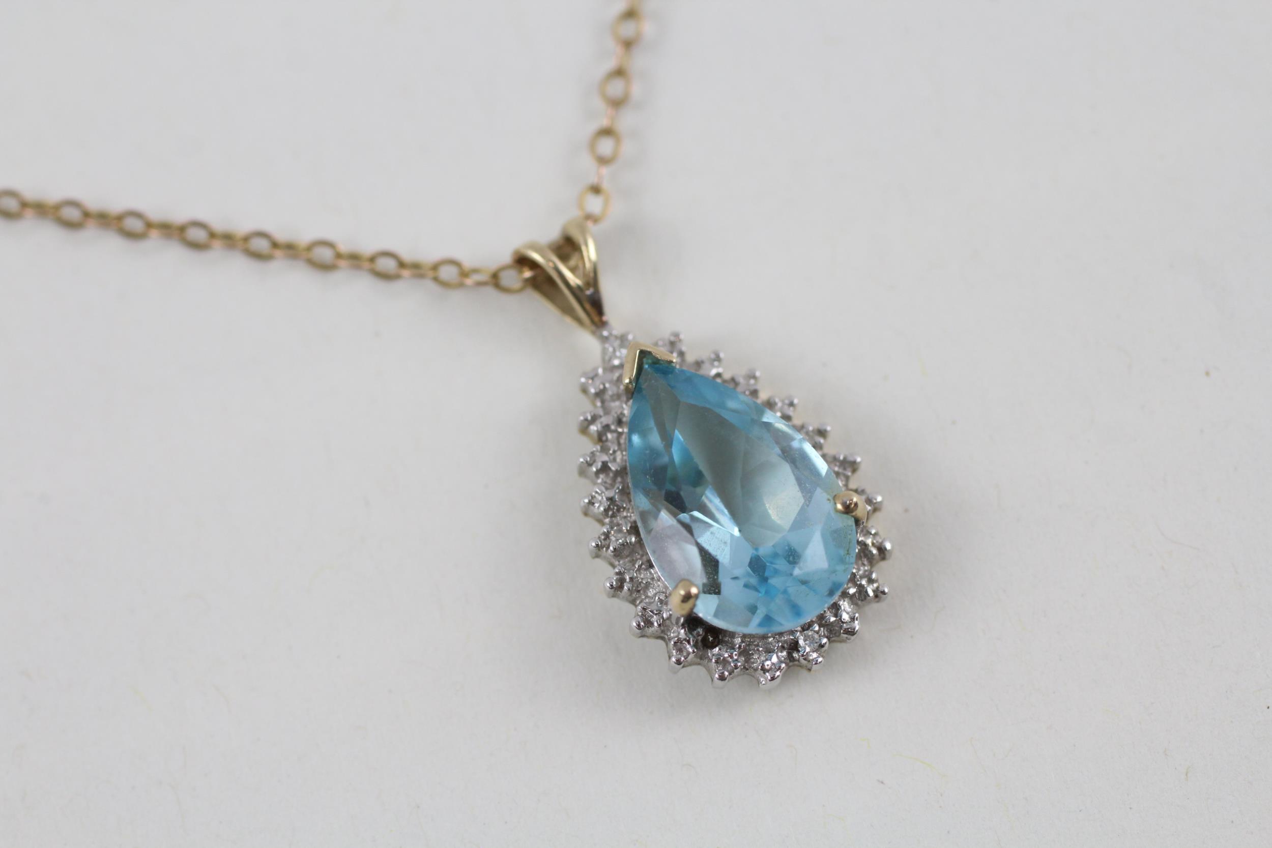 9ct gold pear cut blue topaz & diamond cluster pendant necklace (3.8g)