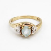 9ct gold oval cut aquamarine & white gemstone dress ring, claw set (2.6g) Size N