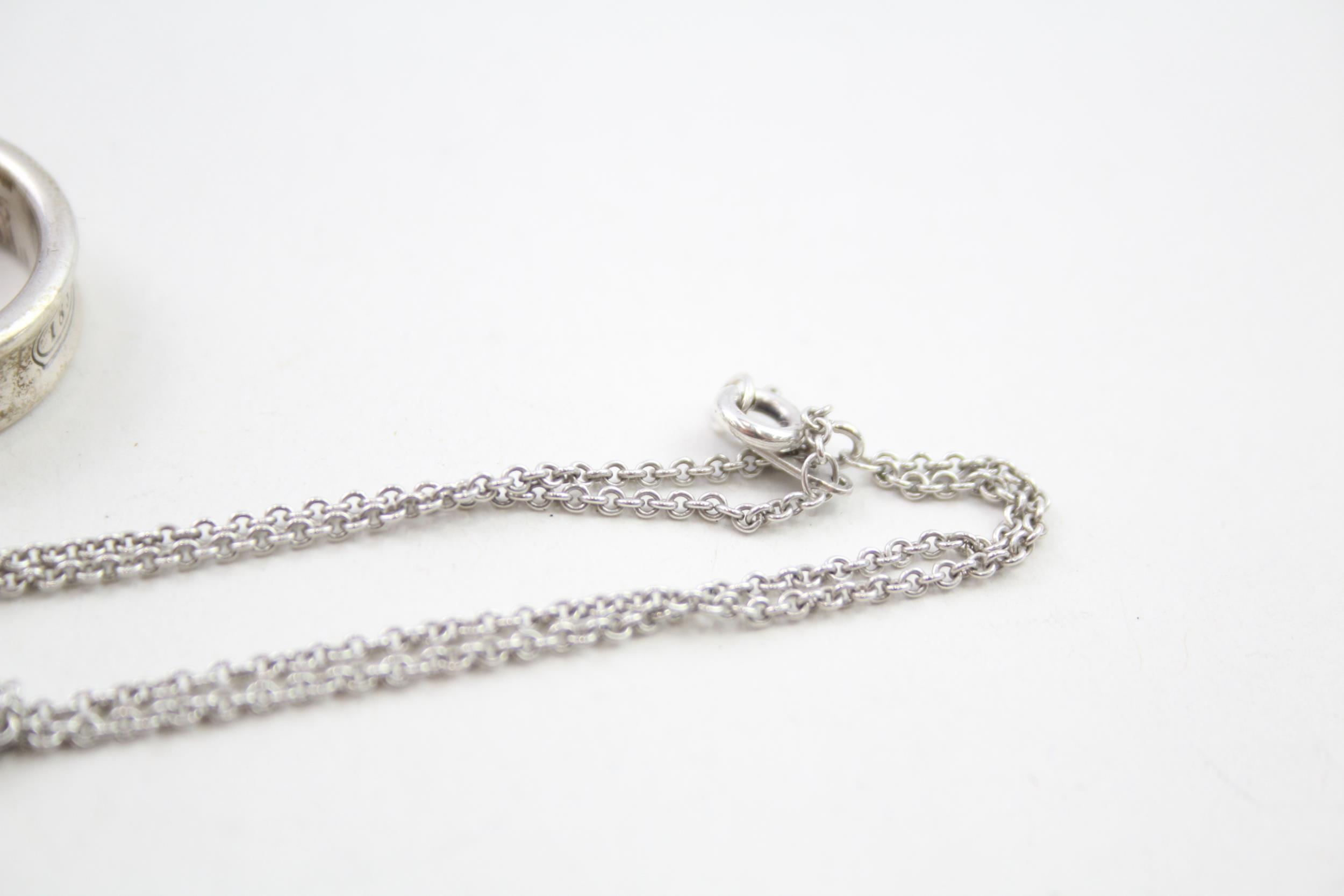 A silver bracelet, ring and pendant by Tiffany and Co (13g) - Image 6 of 6