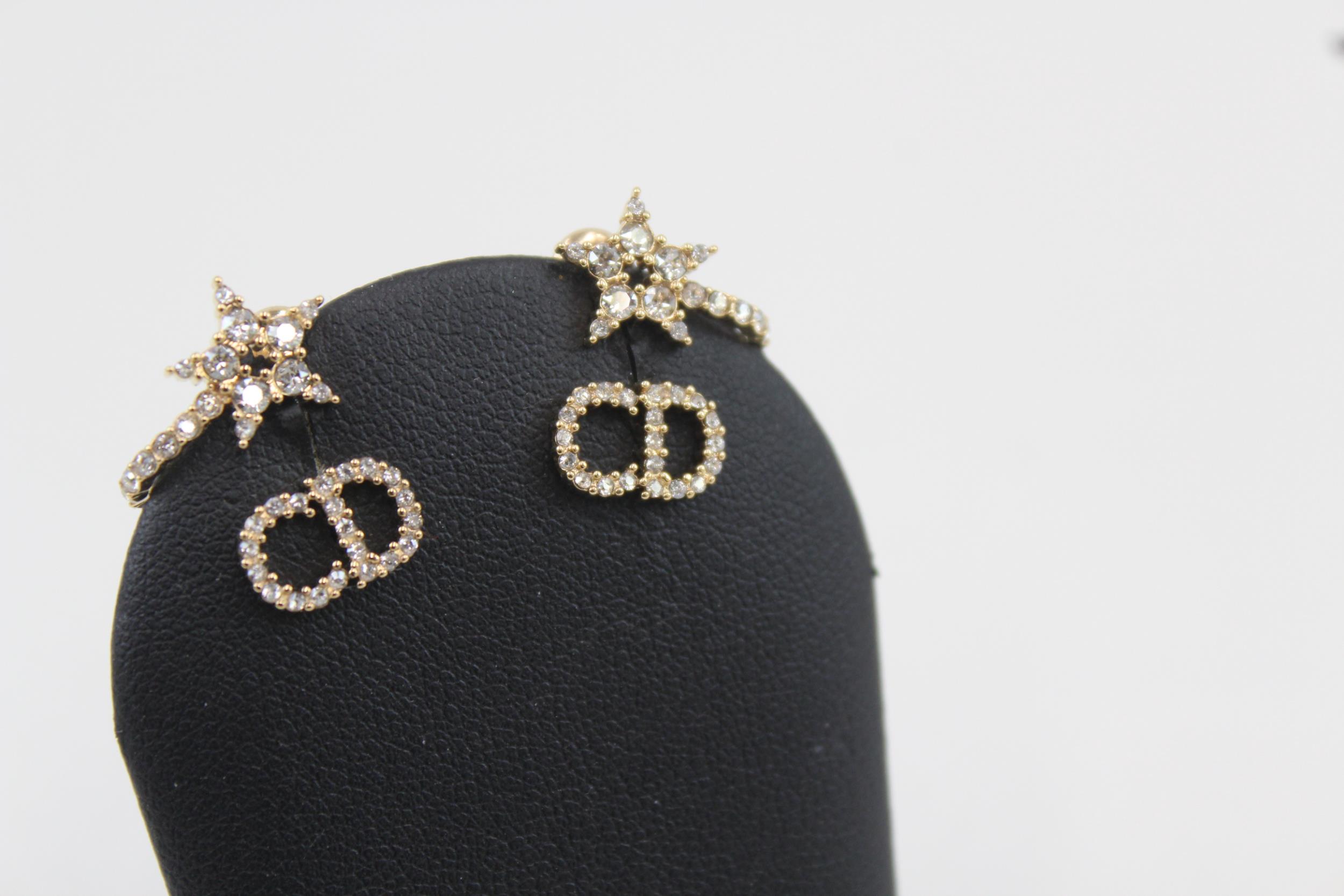 Pair of gold tone rhinestone earrings by designer Christian Dior with pouch (3g) - Image 6 of 7