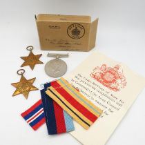 WWII Boxed Arms Africa Star medal group inc. medals, wax packets, award note and ribbons. Box from