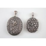 Two silver antique locket pendants with high relief designs (27g)
