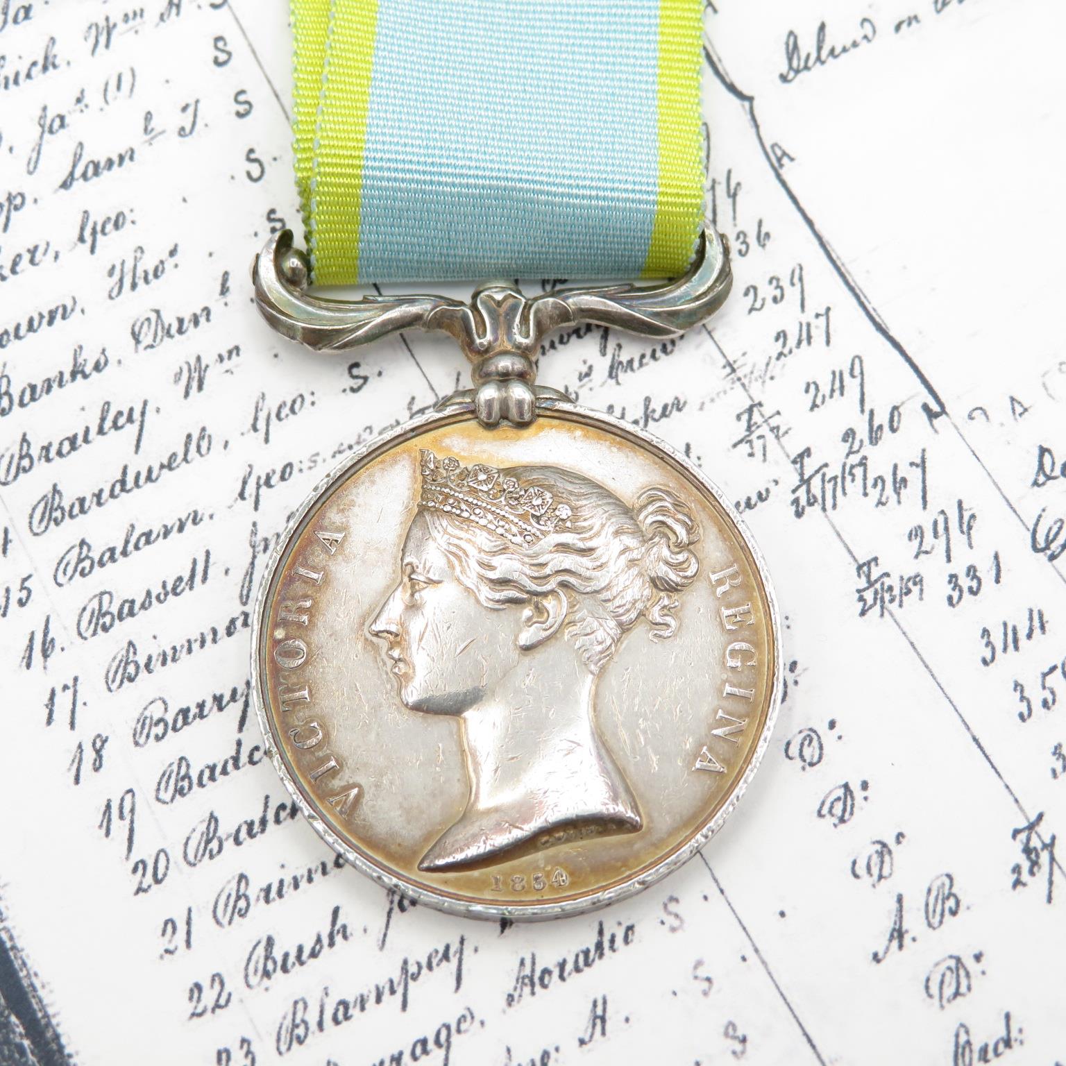 Victorian Navy Crimea medal named Briscombe HMS Jean De Acre with small amount of research paperwork