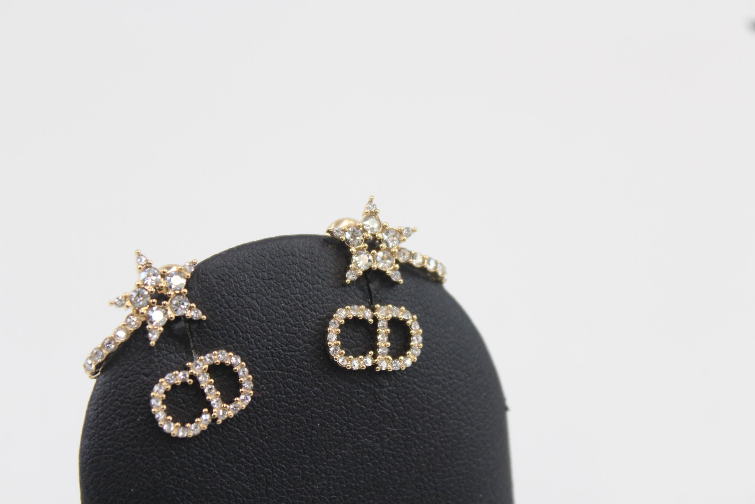 Pair of gold tone rhinestone earrings by designer Christian Dior with pouch (3g) - Image 5 of 7
