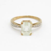 9ct gold spodumene single stone ring with diamond sides Size O