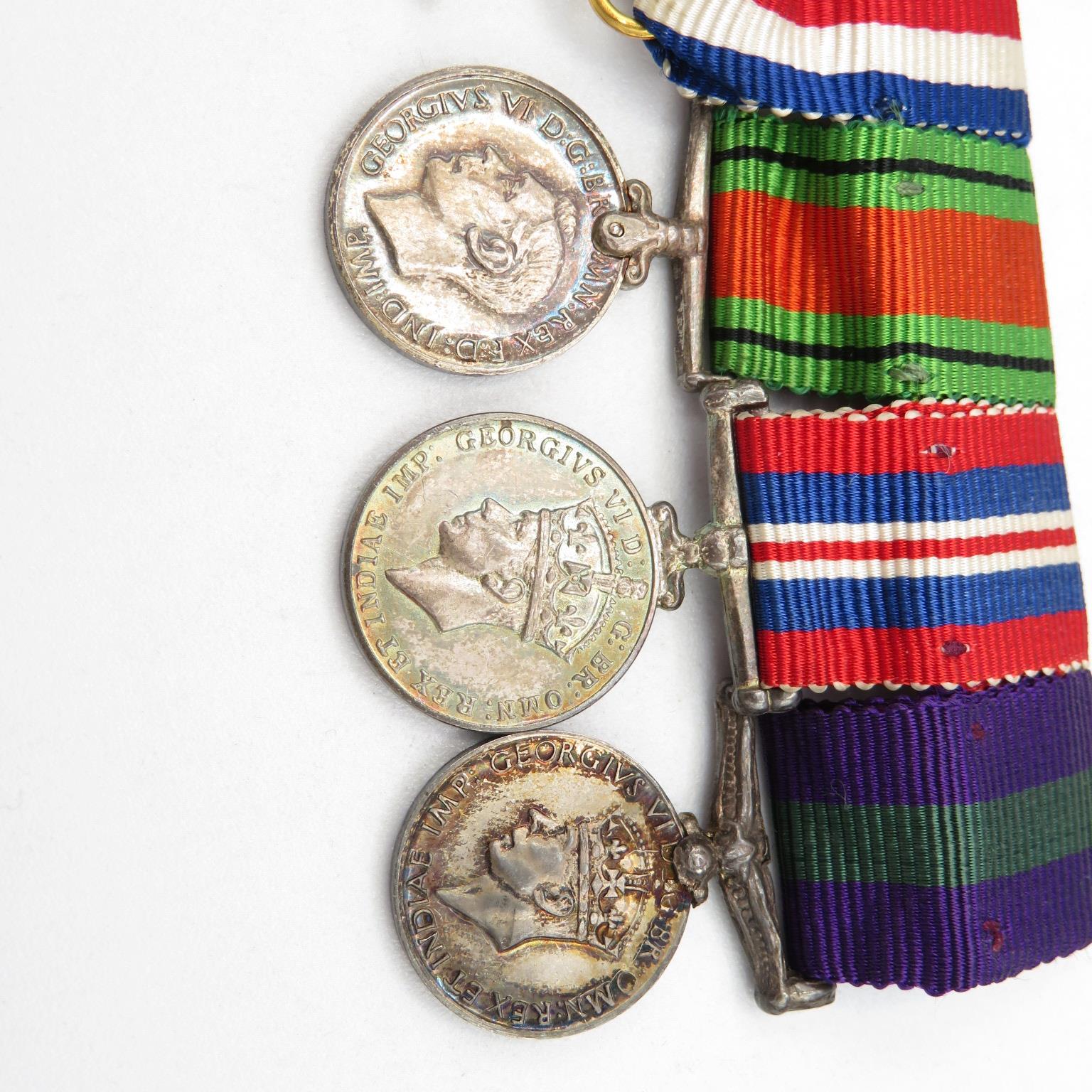 WWII mounted medal group inc. full size and miniature + Regimental tie and Royal Engineers Cap Badge - Image 10 of 14