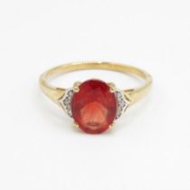 9ct gold red gemstone single stone ring with diamond sides Size R 1/2 2.1 g