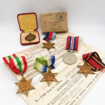Boxed WWII Navy medal group and original paperwork inc. Atlantic Burma-Italy Stars etc. All