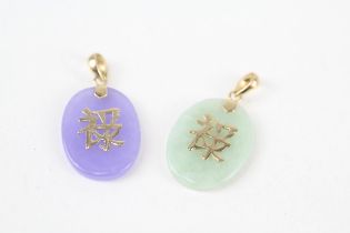 2 x 14ct gold jade and enhanced jade pendants