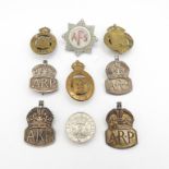 WWI and WWII badges x9 including sterling silver ARP munition volunteers etc. -