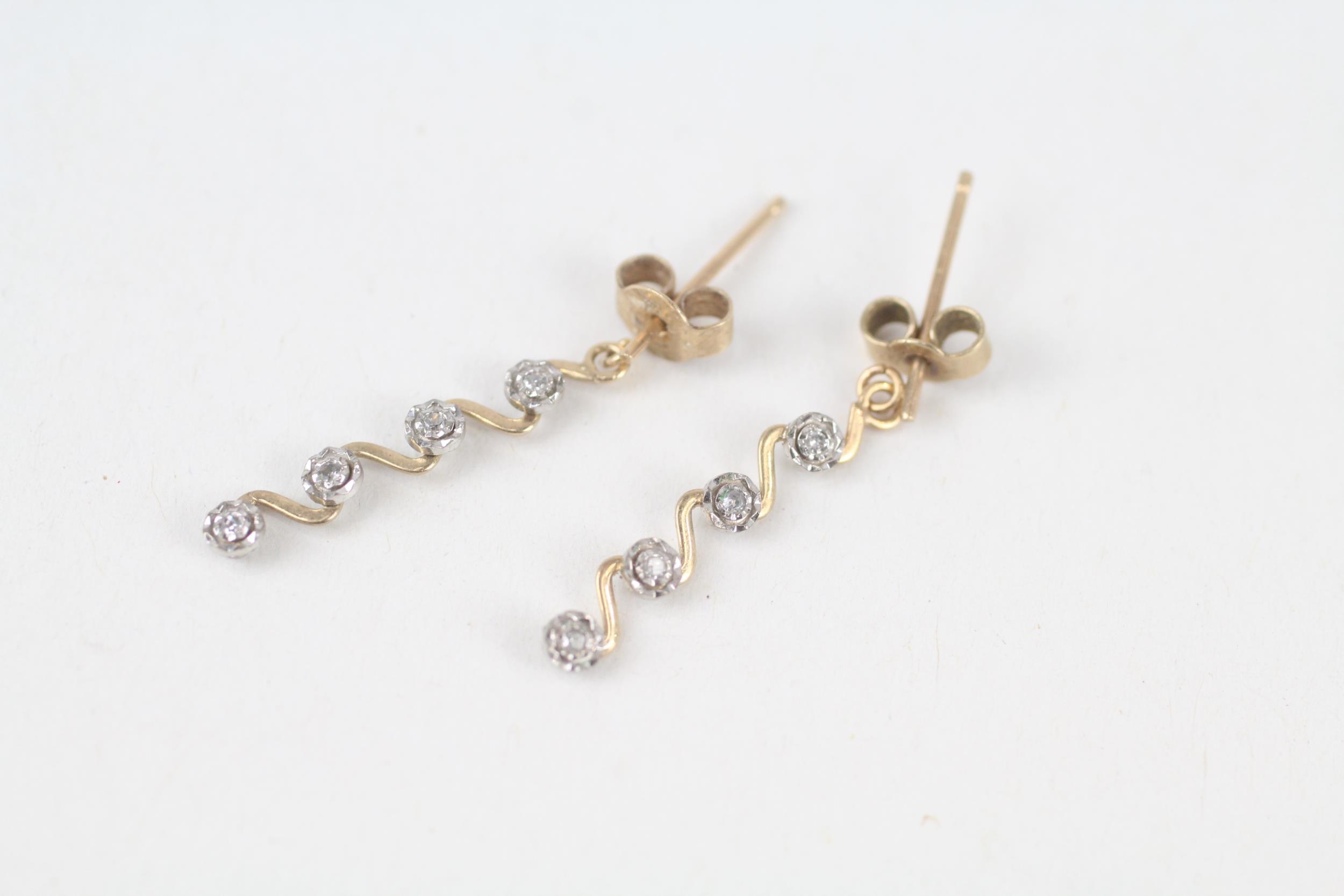 9ct gold diamond four stone drop earrings with scroll backs 1 g