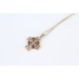 9ct gold garnet four stone openwork cross pendant 2 g