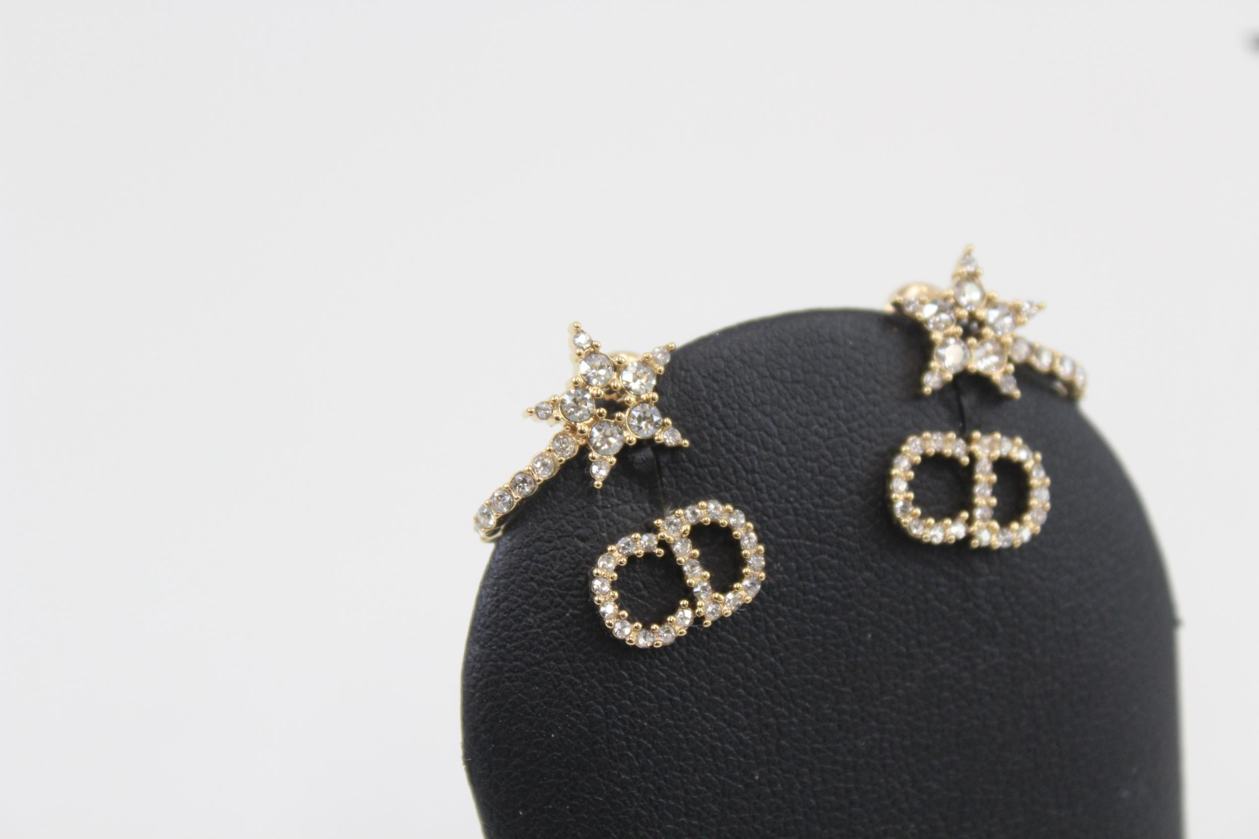 Pair of gold tone rhinestone earrings by designer Christian Dior with pouch (3g) - Image 3 of 7