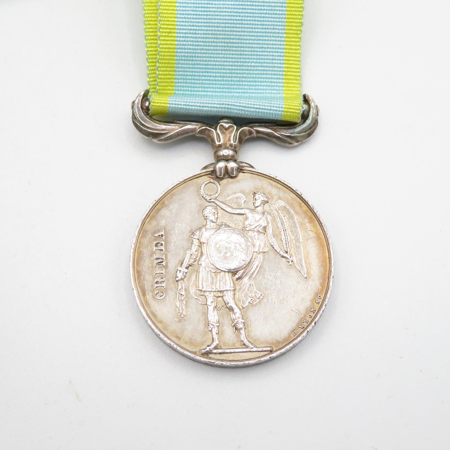 Victorian Navy Crimea medal named Briscombe HMS Jean De Acre with small amount of research paperwork - Image 3 of 5