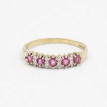 9ct gold ruby five stone ring with diamond dividers Size P