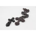 A collection of Vulcanite and Bog Oak cross jewellery (58g)