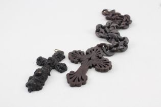 A collection of Vulcanite and Bog Oak cross jewellery (58g)