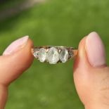9ct gold aquamarine three stone ring with diamond set heart motif shank Size R 2.7 g