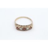 9ct gold garnet & opal ring, with scroll patterned gallery Size O 2.1 g