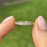 9ct gold diamond half eternity ring, total diamond weight: 0.20ct approximately Size Q 1.6 g