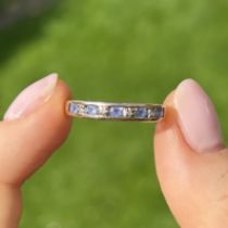 9ct gold tanzanite & diamond half eternity ring, channel set Size O 1.4 g