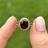 9ct gold oval garnet single stone ring Size L 2.5 g