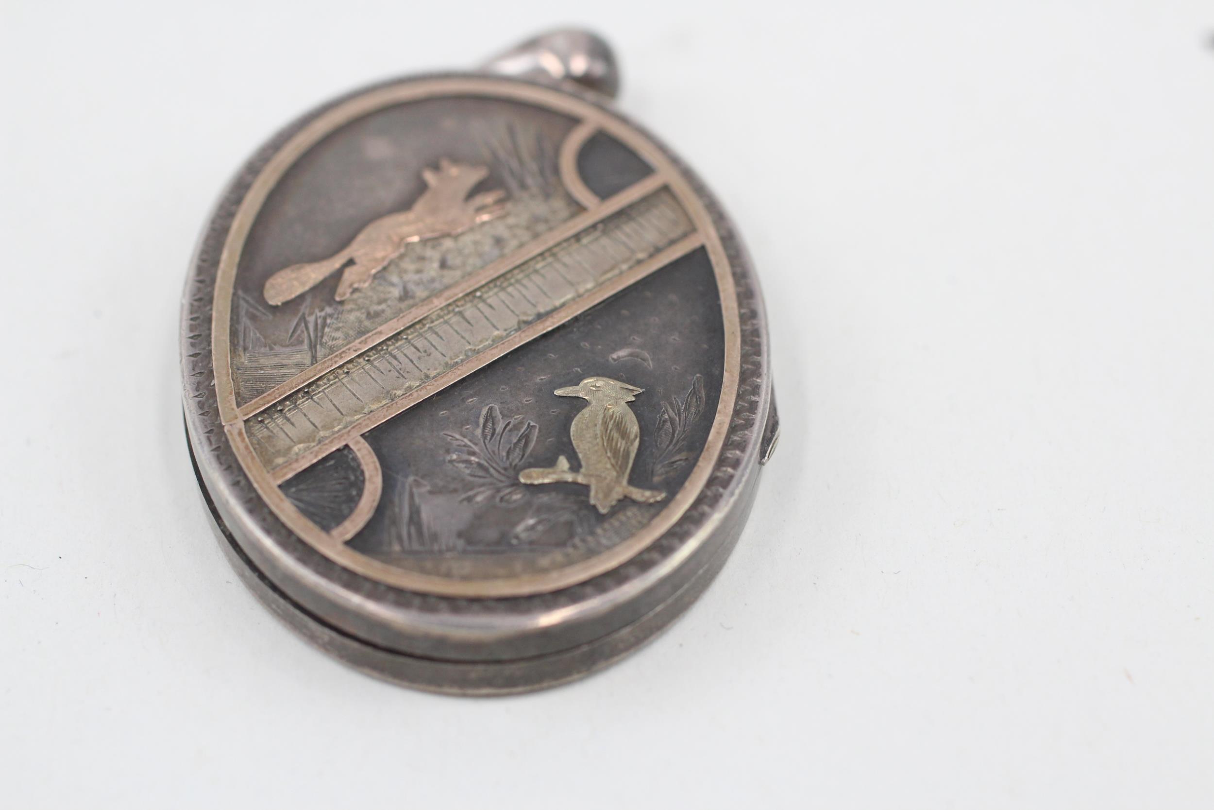 Silver antique aesthetic movement locket pendant with gold detailing (27g) - Image 2 of 6