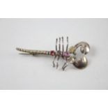 Silver 1930s scorpion brooch set with gemstones (3g)