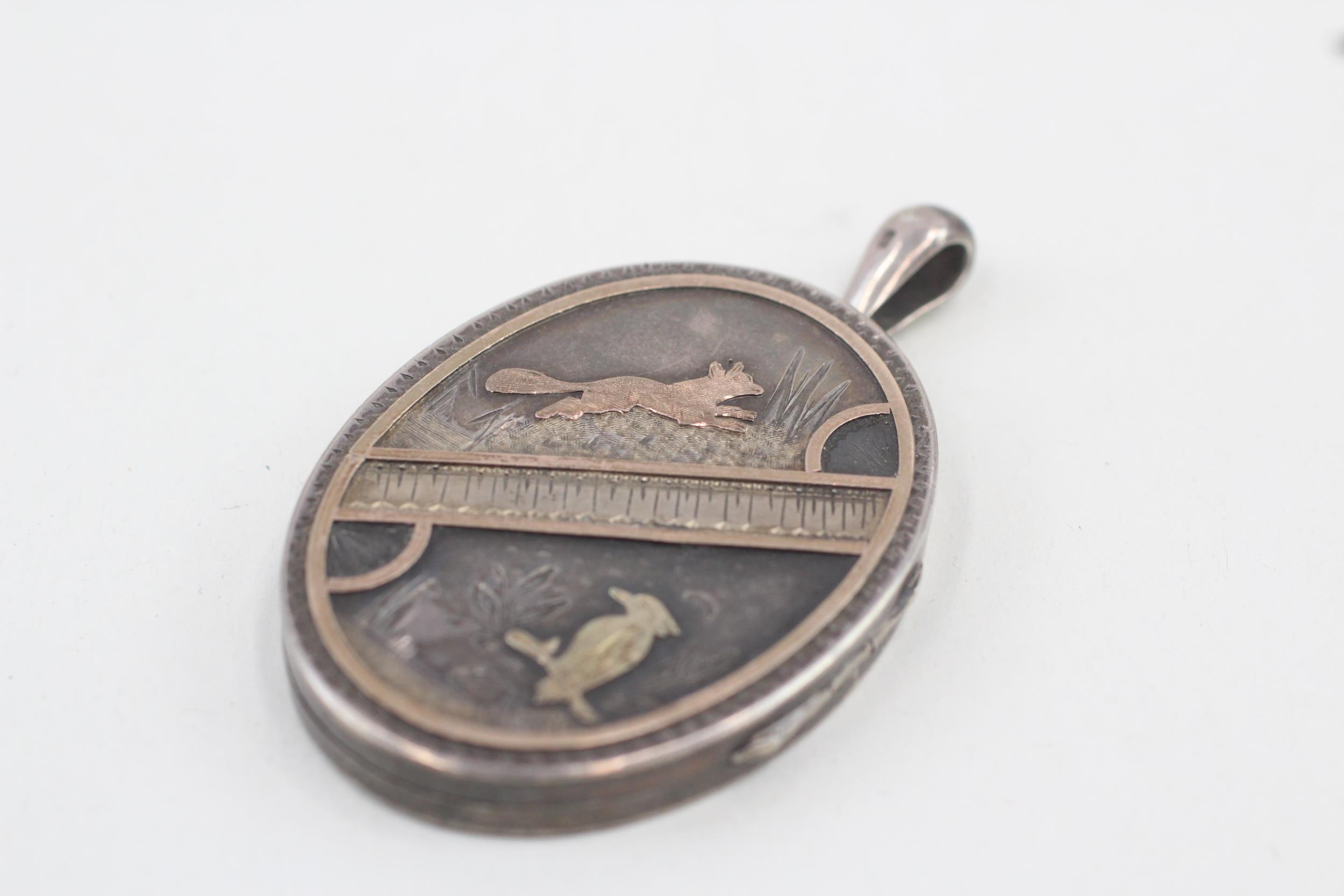 Silver antique aesthetic movement locket pendant with gold detailing (27g)