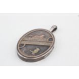 Silver antique aesthetic movement locket pendant with gold detailing (27g)