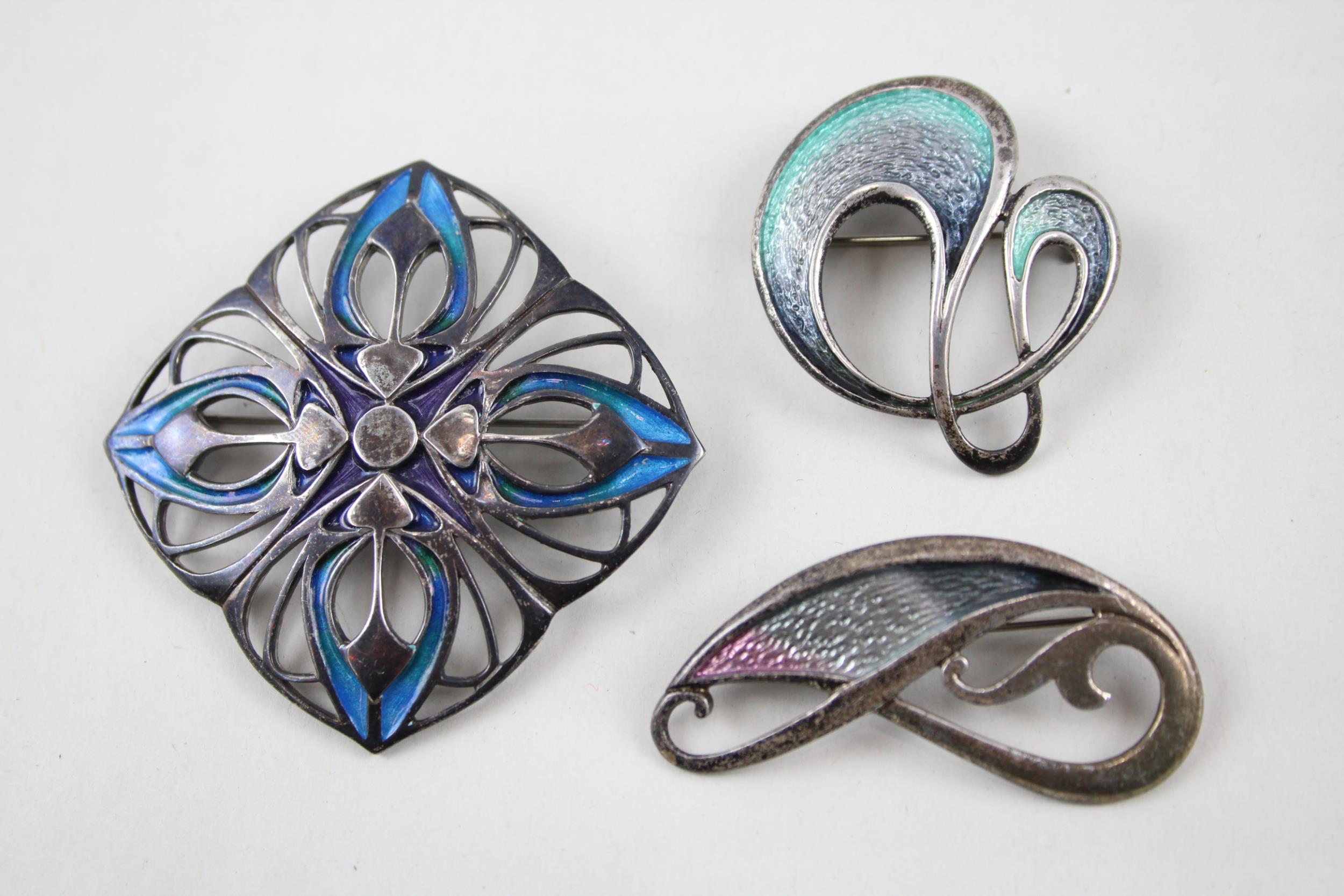 Three silver enamel brooches including Malcolm Gray and Pat Cheney (32g)