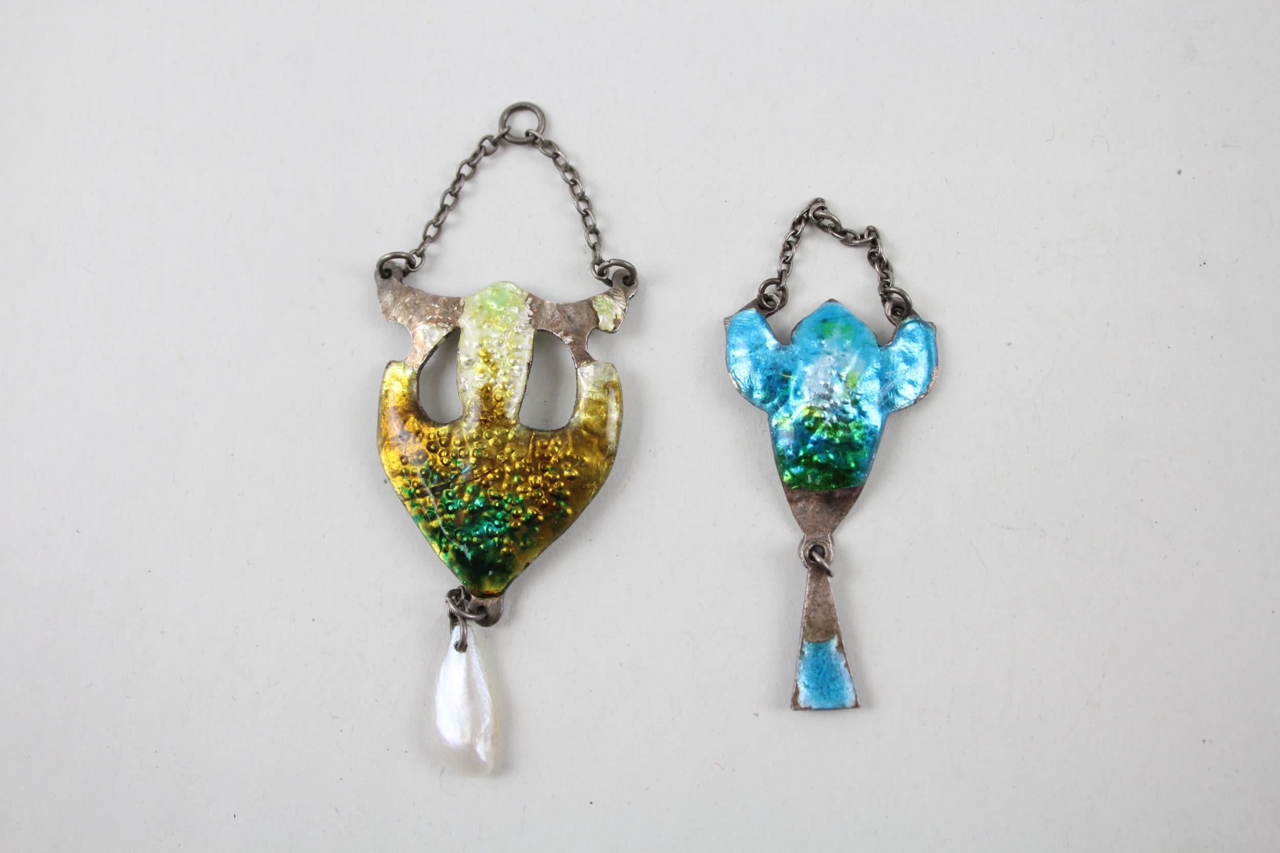 Two silver Arts & Crafts enamel pendants (9g)