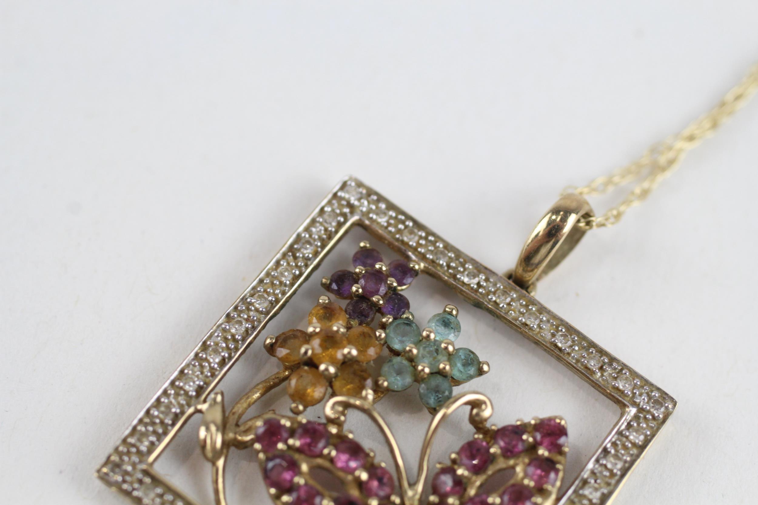 9ct gold multi gemstone floral pendant necklace, gemstones including: diamond, blue topaz, amethyst, - Image 2 of 4