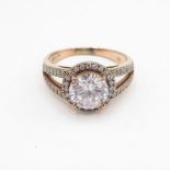 HM 9ct rose gold dress ring with white CZ centre stone and white stone accents (4.1g) Size P