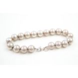 A silver beaded bracelet by Tiffany and Co (20g)