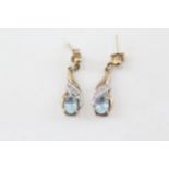 9ct gold oval cut blue topaz and diamond set drop earrings - 1.6 g