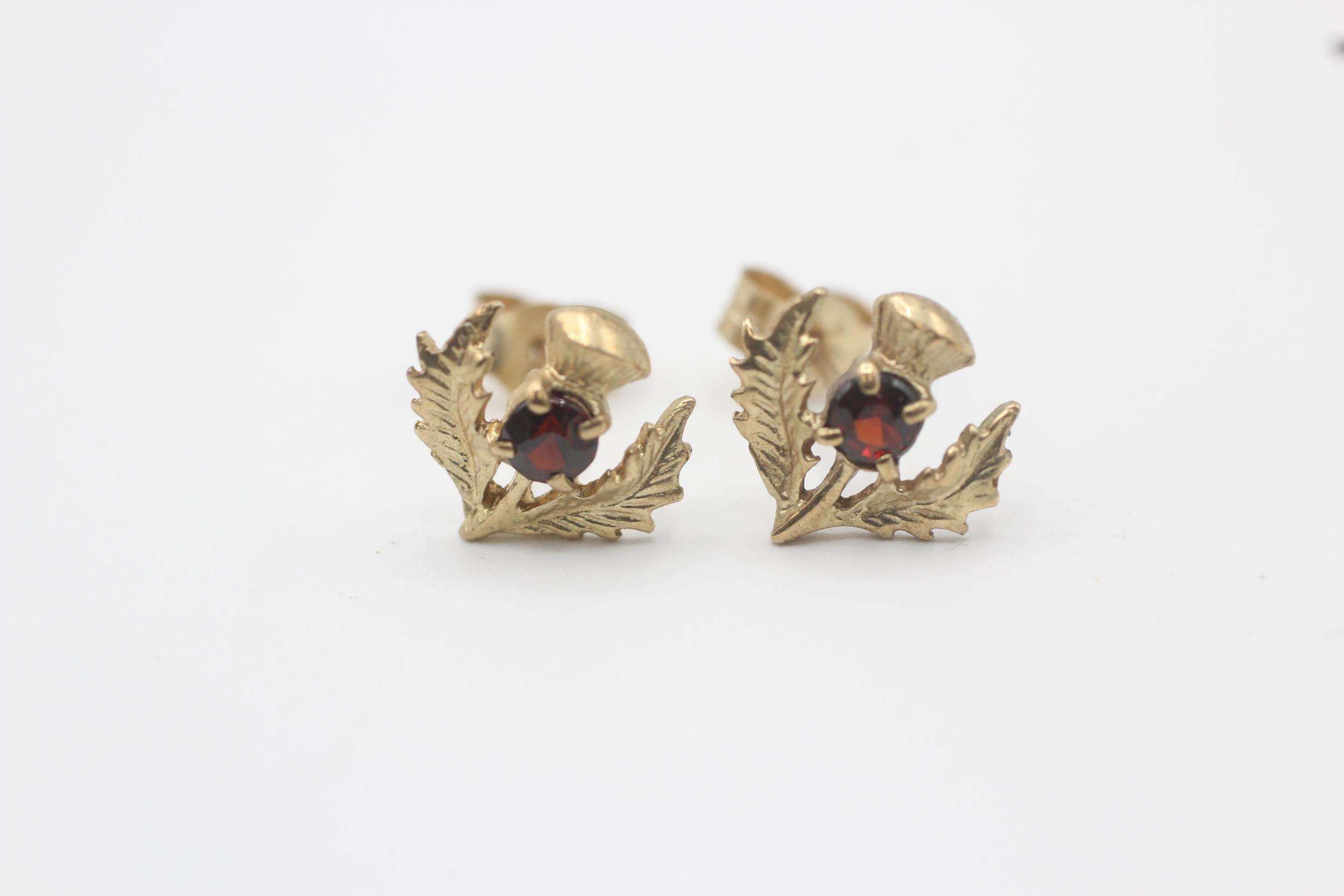 9ct gold garnet stud earrings, with scroll backs - 1.1 g