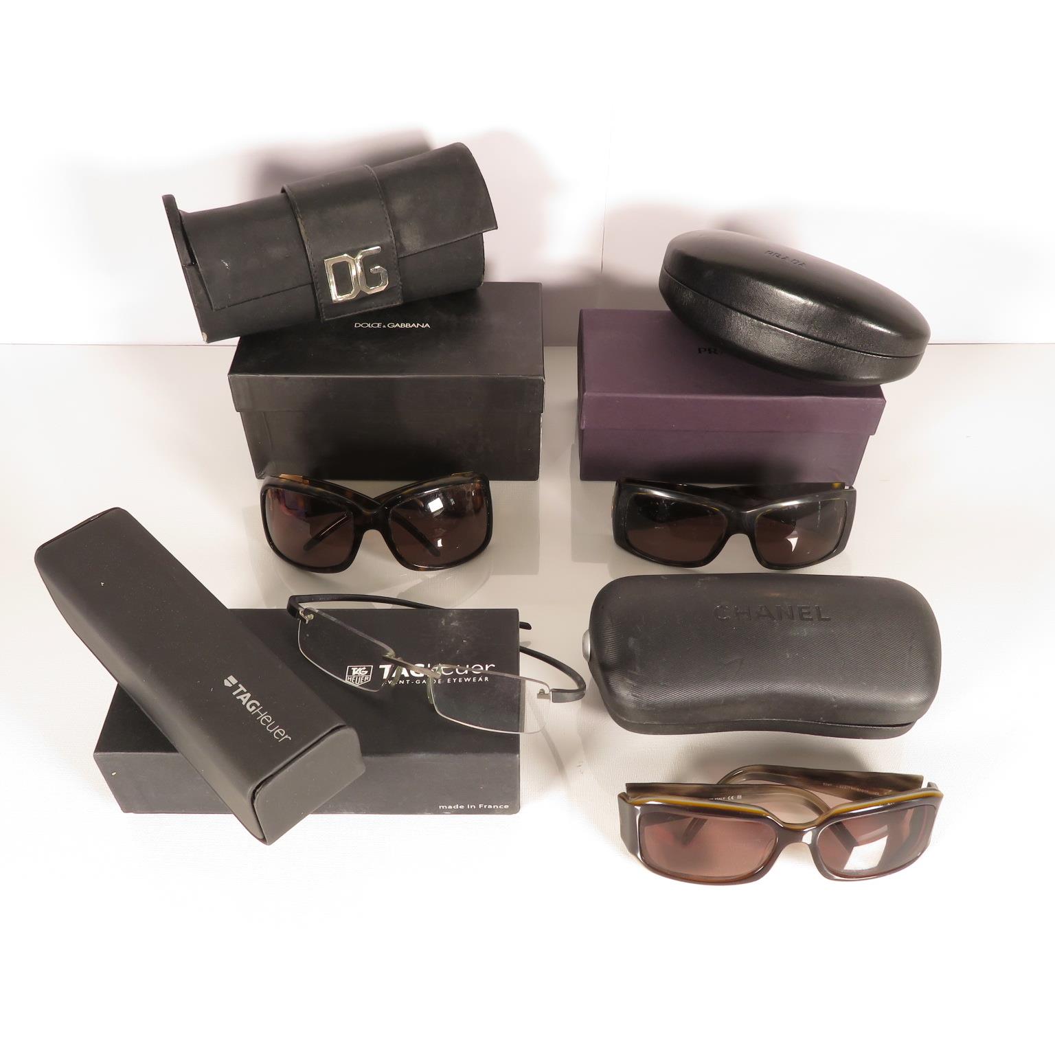 Collection of Dolce & Gabbana Prada Tag Heuer and Chanel sunglasses boxed -