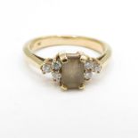 HM 9ct gold ring with smoky quartz and CZ centre stone (2.9) Size M
