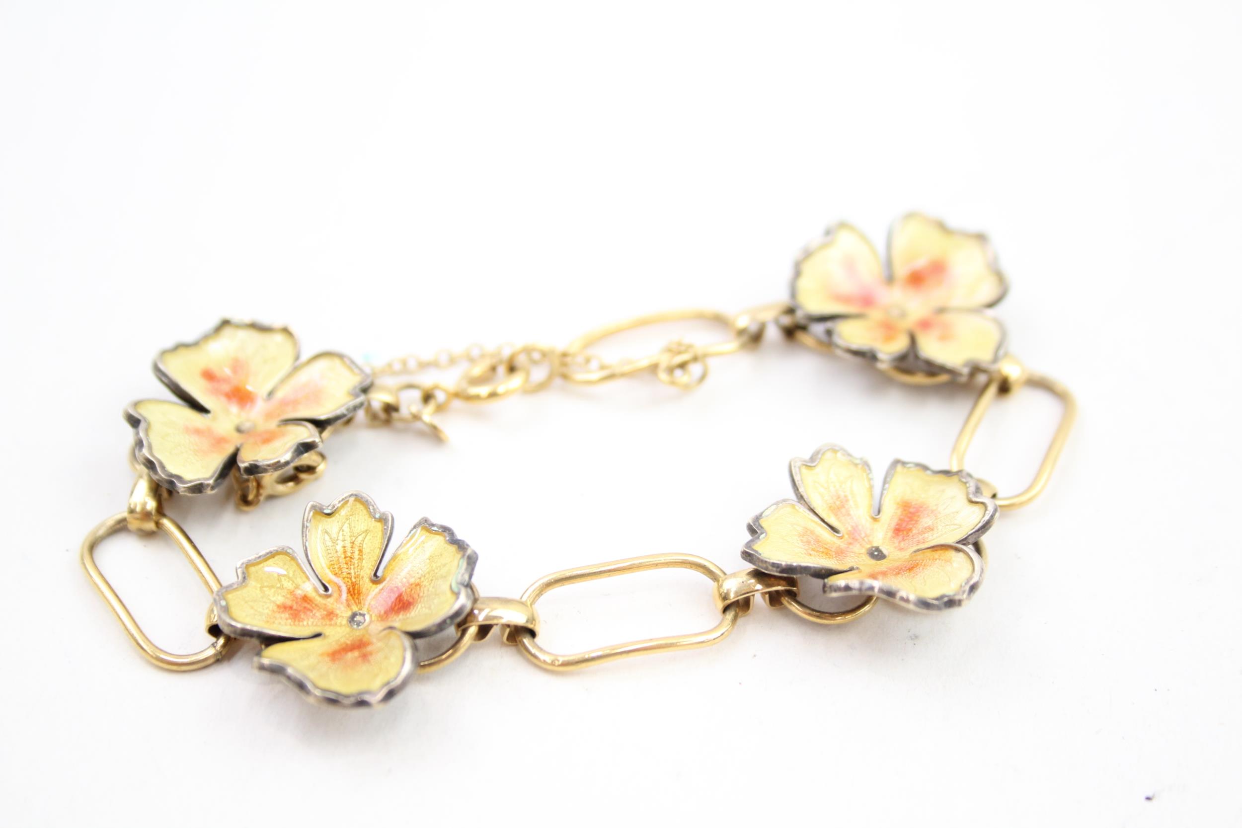 A mid century gold plated and silver enamel bracelet by Wells (18g)
