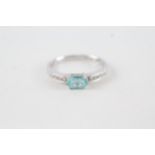 9ct gold oval cut blue gemstone & diamond ring (1.4g) Size L