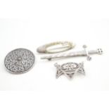 Four Scottish silver brooches including Ola Gorie (33g)