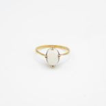 9ct gold cabochon cut opal solitaire ring, claw set (1.2g) Size P