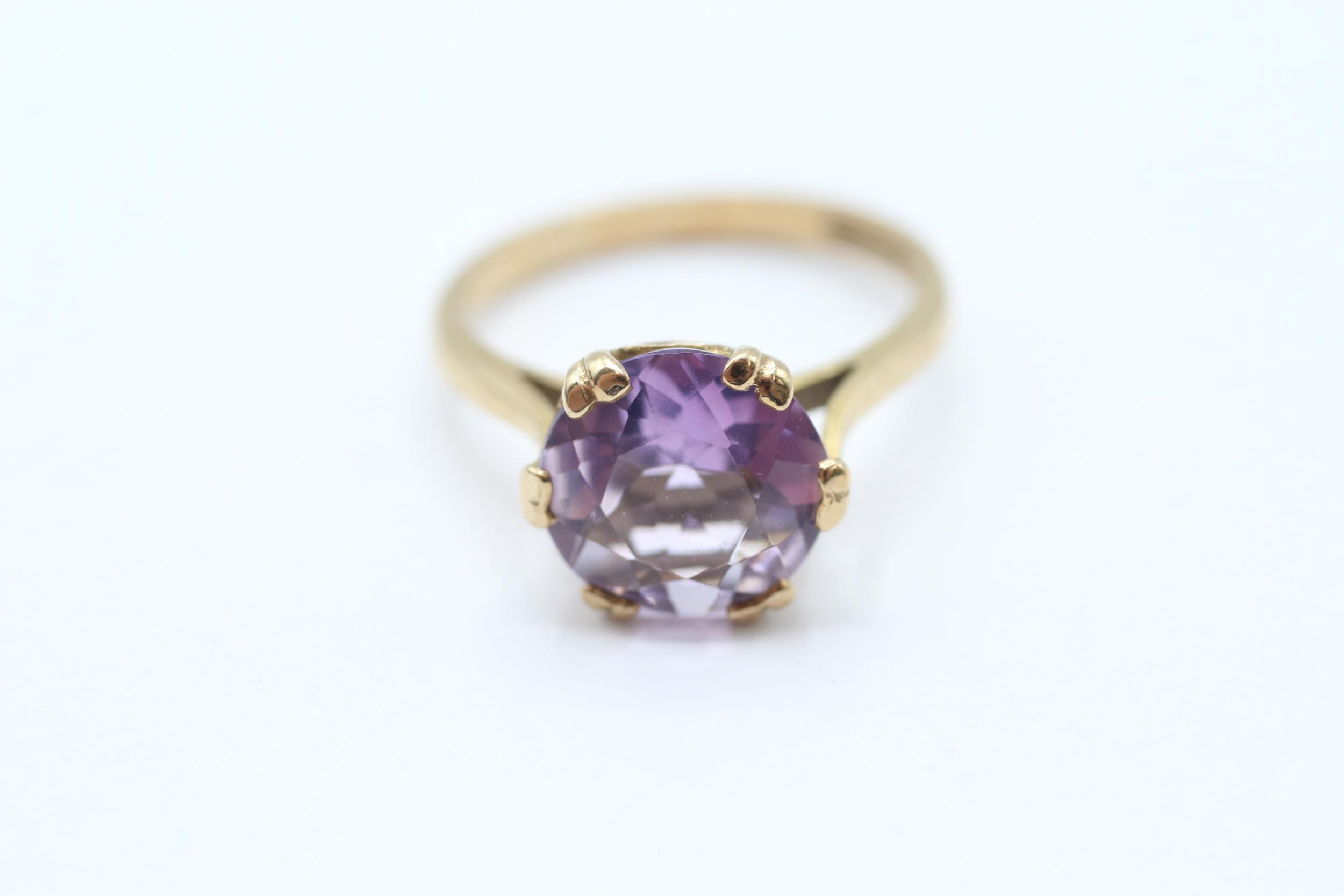 9ct gold vintage amethyst dress ring with a heart patterned gallery. Hallmarked Edinburgh 1968